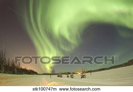 The Aurora Borealis, or Northern Lights, shines above Bear Lake. View Large Photo Image Picture - The Aurora Borealis, or Northern Lights, shines above Bear Lake.. Fotosearch
