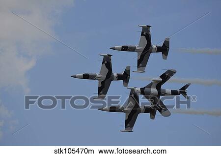 The Black Diamond Jet Team fly in diamond formation. View Large Photo Image Picture - The Black Diamond Jet Team fly in diamond formation.. Fotosearch