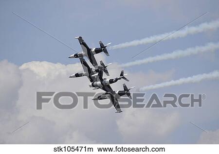 Picture - The Black Diamond Jet Team fly in diamond formation.. Fotosearch