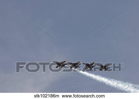 The Blue Angels perform aerial demonstrations during an air show. View Large Photo Image Picture - The Blue Angels perform aerial demonstrations during an air show.. Fotosearch