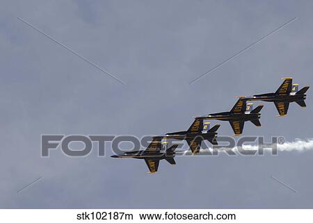 The Blue Angels perform aerial demonstrations during an air show. View Large Photo Image Picture - The Blue Angels perform aerial demonstrations during an air show.. Fotosearch