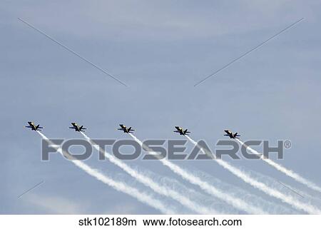 Picture - The Blue Angels perform aerial demonstrations during an air show.. Fotosearch