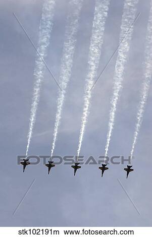 Picture - The Blue Angels perform aerial demonstrations during an air show.. Fotosearch