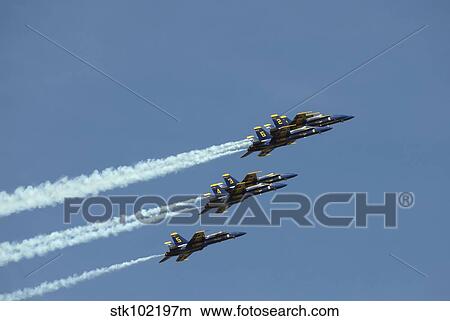 The Blue Angels perform aerial demonstrations during an air show. View Large Photo Image Picture - The Blue Angels perform aerial demonstrations during an air show.. Fotosearch