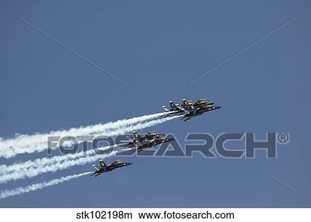The Blue Angels perform aerial demonstrations during an air show. View Large Photo Image Picture - The Blue Angels perform aerial demonstrations during an air show.. Fotosearch