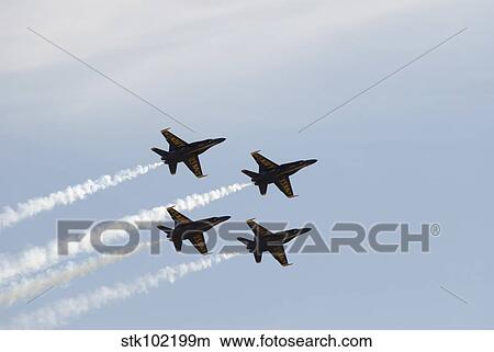The Blue Angels perform aerial demonstrations during an air show. View Large Photo Image Picture - The Blue Angels perform aerial demonstrations during an air show.. Fotosearch