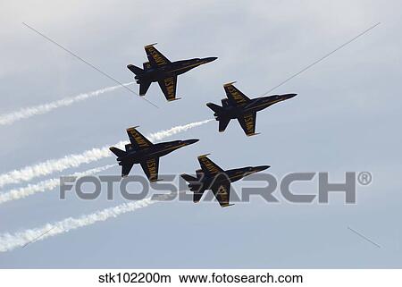 The Blue Angels perform aerial demonstrations during an air show. View Large Photo Image Picture - The Blue Angels perform aerial demonstrations during an air show.. Fotosearch