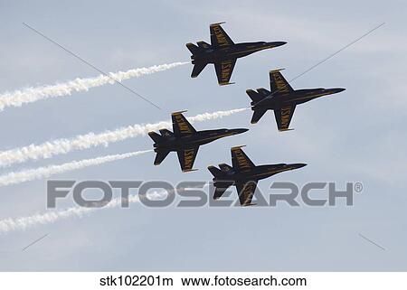 The Blue Angels perform aerial demonstrations during an air show. View Large Photo Image Picture - The Blue Angels perform aerial demonstrations during an air show.. Fotosearch