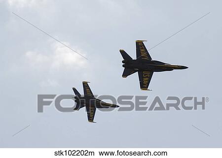 The Blue Angels perform aerial demonstrations during an air show. View Large Photo Image Picture - The Blue Angels perform aerial demonstrations during an air show.. Fotosearch