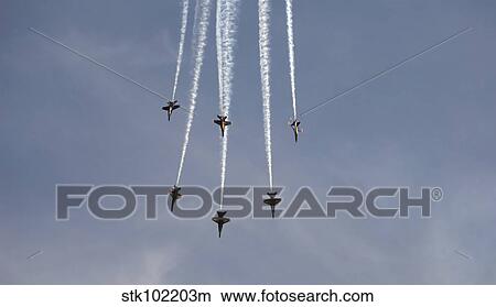 The Blue Angels perform aerial demonstrations during an air show. View Large Photo Image Picture - The Blue Angels perform aerial demonstrations during an air show.. Fotosearch