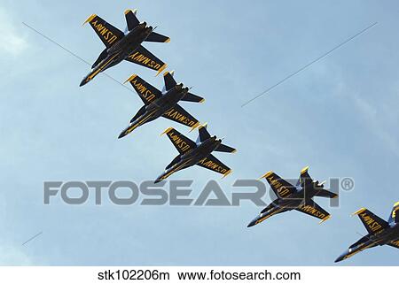 The Blue Angels perform aerial demonstrations during an air show. View Large Photo Image Picture - The Blue Angels perform aerial demonstrations during an air show.. Fotosearch
