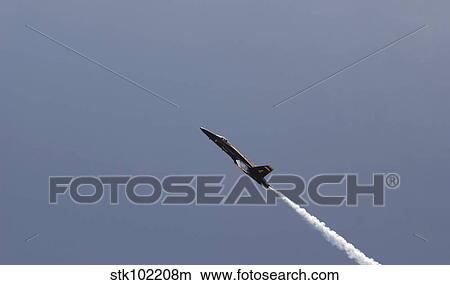 The Blue Angels perform aerial demonstrations during an air show. View Large Photo Image Picture - The Blue Angels perform aerial demonstrations during an air show.. Fotosearch