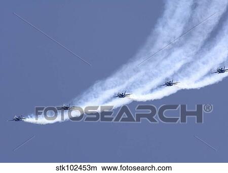 The Blue Angels performing a line abreast loop during an air show. View Large Photo Image Picture - The Blue Angels performing a line abreast loop during an air show.. Fotosearch