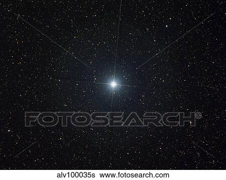 Stock Photograph - The bright star Altair in the constellation Aquila.. Fotosearch