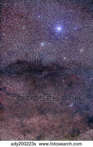 Stock Photograph - The Coalsack and Jewel Box Cluster in the Southern Cross.. Fotosearch