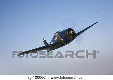 The Commemorative Air Force's F6F-5 Hellcat in flight. View Large Photo Image Picture - The Commemorative Air Force's F6F-5 Hellcat in flight.. Fotosearch