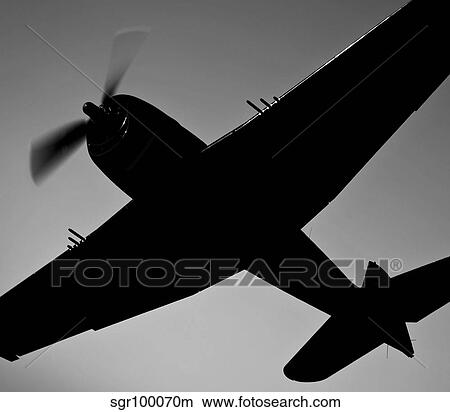 The Commemorative Air Force's F6F-5 Hellcat in flight. View Large Photo Image Picture - The Commemorative Air Force's F6F-5 Hellcat in flight.. Fotosearch