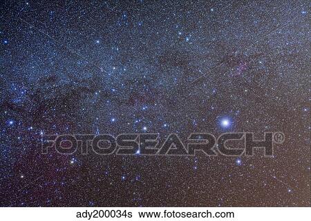 Stock Photograph - The constellation of Canis Major with nearby deep sky objects.. Fotosearch