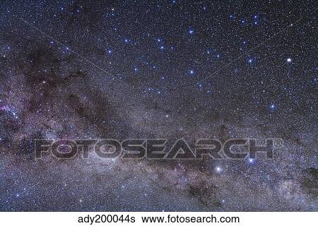The constellation of Centaurus and its dark lanes of nebulosity. View Large Photo Image Stock Photograph - The constellation of Centaurus and its dark lanes of nebulosity.. Fotosearch