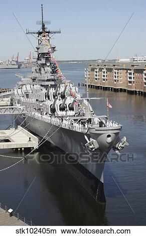 The decommissioned U. S. Navy Battleship, USS Wisconsin, berthed to the pier. View Large Photo Image Picture - The decommissioned U. S. Navy Battleship, USS Wisconsin, berthed to the pier.. Fotosearch