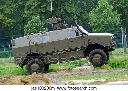 The Dingo 2 MPPV of the Belgian Army on rough terrain. View Large Photo Image Picture - The Dingo 2 MPPV of the Belgian Army on rough terrain.. Fotosearch