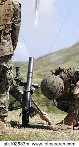 The direct-lay method of firing mortars. View Large Photo Image Picture - The direct-lay method of firing mortars.. Fotosearch