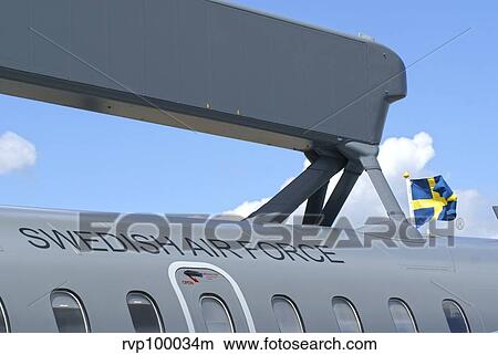 The early warning radar on a Saab 340 of Swedish Air Force. View Large Photo Image Picture - The early warning radar on a Saab 340 of Swedish Air Force.. Fotosearch