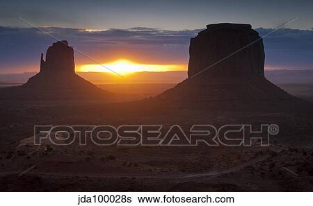 The famous Mitten formations in Monument Valley, Utah. View Large Photo Image Stock Photograph - The famous Mitten formations in Monument Valley, Utah.. Fotosearch