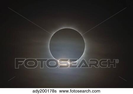 The first diamond ring during the total eclipse of the Sun. View Large Photo Image Stock Photograph - The first diamond ring during the total eclipse of the Sun.. Fotosearch