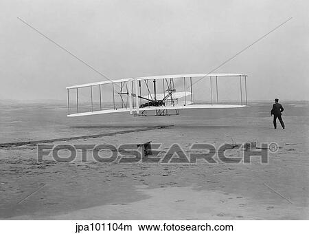 Picture - The first flight of the Wright Flyer in 1903.. Fotosearch