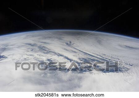 The gray shadow of the moon cast on bright clouds of the northern Pacific Ocean View Large Photo Image Stock Photograph - The gray shadow of the moon cast on bright clouds of the northern Pacific Ocean. Fotosearch