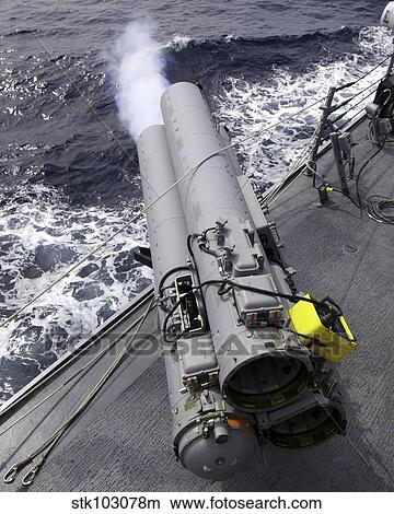 The guided missile destroyer USS Mustin (DDG-89), test fires the MK-32 Mod-15 Torpedo Launcher. View Large Photo Image Picture - The guided missile destroyer USS Mustin (DDG-89), test fires the MK-32 Mod-15 Torpedo Launcher. . Fotosearch