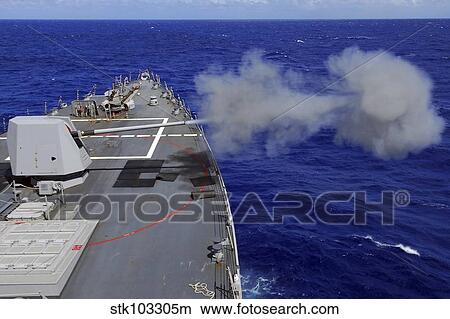 The guided-missile destroyer USS McCampbell fires the MK-45 gun system. View Large Photo Image Picture - The guided-missile destroyer USS McCampbell fires the MK-45 gun system.. Fotosearch
