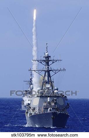 The guided-missile destroyer USS Benfold fires a surface-to-air missile off the coast of Hawaii. View Large Photo Image Picture - The guided-missile destroyer USS Benfold fires a surface-to-air missile off the coast of Hawaii.. Fotosearch