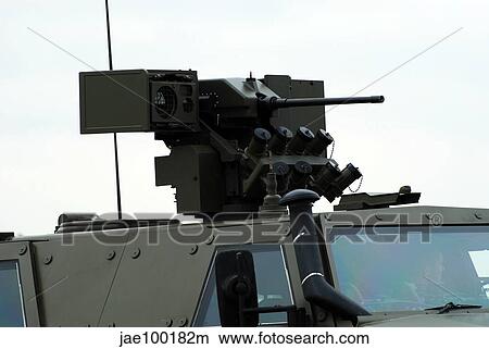 The gun mounted on top of the Dingo II armoured vehicle, used by the Belgian Army. View Large Photo Image Picture - The gun mounted on top of the Dingo II armoured vehicle, used by the Belgian Army.. Fotosearch