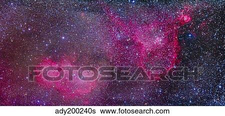 Stock Photograph - The Heart and Soul Nebulae in the constellation Cassiopeia.. Fotosearch