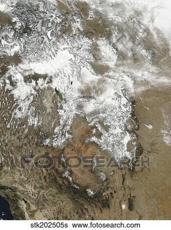 Stock Photograph - The high peaks of the Rocky Mountains covered with snow.. Fotosearch