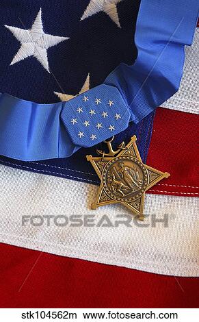 The Medal of Honor rests on a flag during preparations for an award ceremony View Large Photo Image Picture - The Medal of Honor rests on a flag during preparations for an award ceremony. Fotosearch