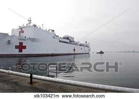 The Military Sealift Command hospital ship USNS Comfort pulls away from Canton Pier. View Large Photo Image Picture - The Military Sealift Command hospital ship USNS Comfort pulls away from Canton Pier.. Fotosearch