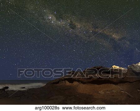 The Milky Way over the cliffs of Miramar, Argentina. View Large Photo Image Stock Photograph - The Milky Way over the cliffs of Miramar, Argentina.. Fotosearch