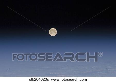The moon and Earth's atmosphere. View Large Photo Image Stock Photograph - The moon and Earth's atmosphere.. Fotosearch
