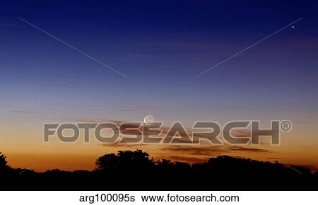Stock Photograph - The Moon and Jupiter in conjunction with Jupiter's moons.. Fotosearch