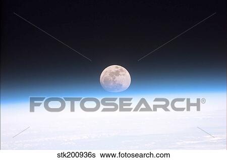 The Moon partially obscured by the atmosphere of Earth. View Large Photo Image Stock Photograph - The Moon partially obscured by the atmosphere of Earth.. Fotosearch