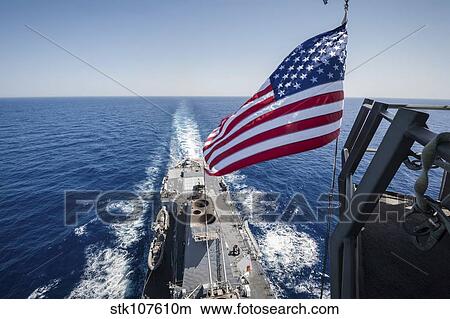 The national ensign flies from the mast aboard USS Stockdale. View Large Photo Image Picture - The national ensign flies from the mast aboard USS Stockdale.. Fotosearch