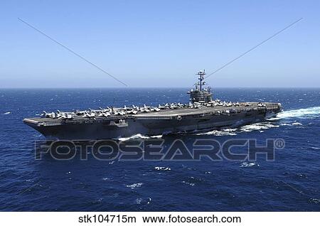 Picture - The Nimitz-class aircraft carrier USS John C. Stennis underway in the Pacific Ocean.. Fotosearch