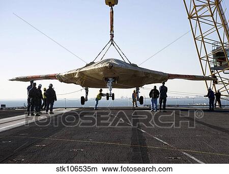 Picture - The onload of the X-47B Unmanned Combat Air System.. Fotosearch