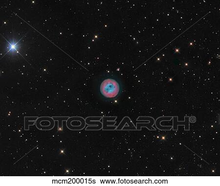 Stock Photograph - The Owl Nebula, a planetary nebula in Ursa Major.. Fotosearch