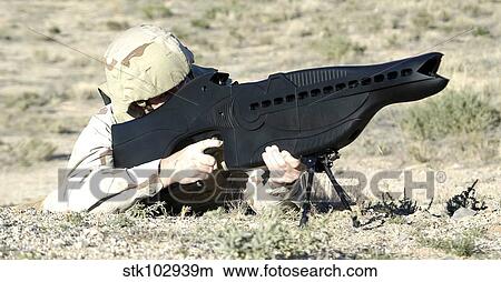 The Personnel Halting and Stimulation Response (PHaSR) is a rifle-sized laser weapon system. View Large Photo Image Picture - The Personnel Halting and Stimulation Response (PHaSR) is a rifle-sized laser weapon system.. Fotosearch