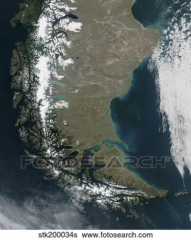 The rugged, snow-capped Andes dominate the left side of this image of Southern Chile and Argentina. View Large Photo Image Stock Photograph - The rugged, snow-capped Andes dominate the left side of this image of Southern Chile and Argentina.. Fotosearch