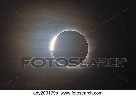 Stock Photograph - The second diamond ring during the total eclipse of the Sun.. Fotosearch